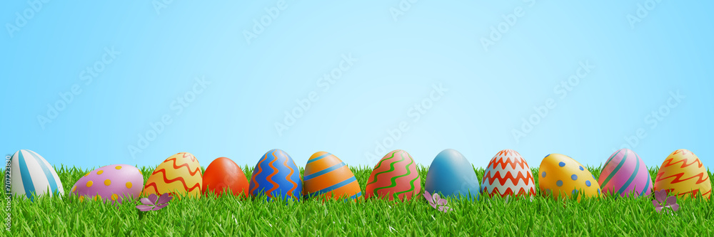 Easter eggs in a row on a meadow in the grass. Banner border 3d rendering