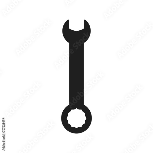 Wrench icon on black background.