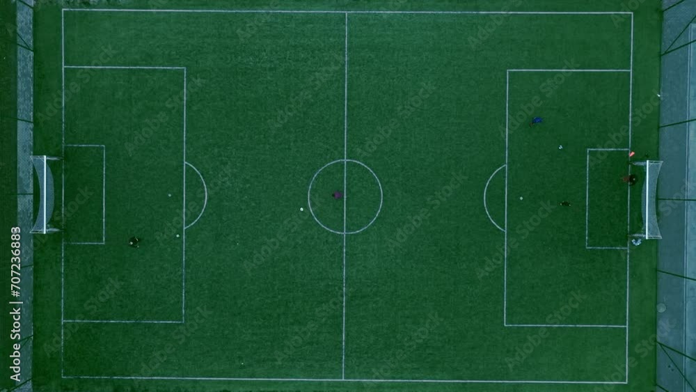 Soaring drone shots capture the beauty of a soccer field from above, showcasing a mesmerizing dance as players engage in a spirited match. Soaring drone shots capture the beauty of a soccer field from above, showcasing a mesmerizing dance as players engage in a spirited match.