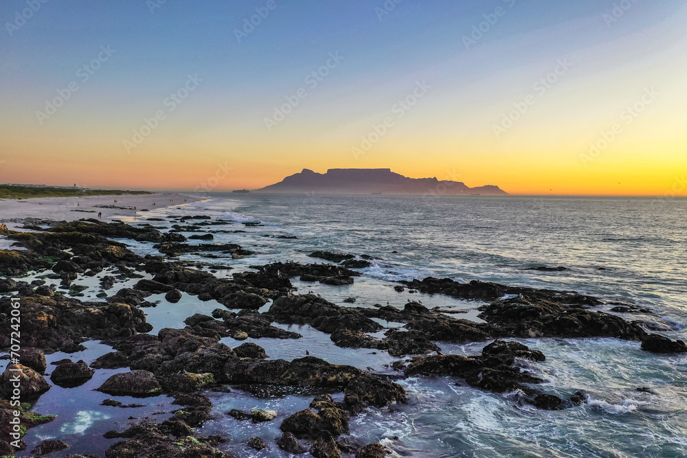 Fototapeta premium Summer evening sunset with a calm sea and clear skies