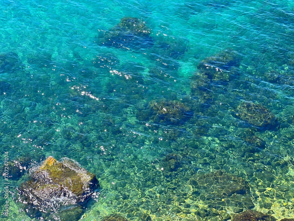 Sea clear transparent water blue turquoise surface.
