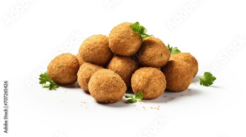 fried organic falafel balls isolated on a white background, a composition or scene in a minimalist modern style, highlighting the textures and flavors of the halafel. photo