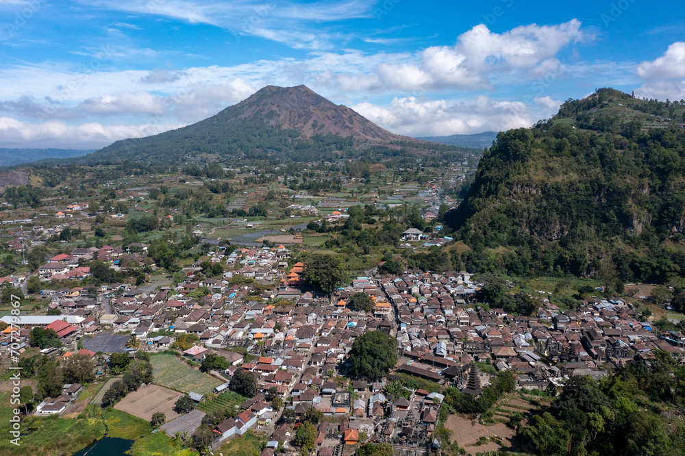 Aerial view of a mountainous landscape with a Batur village