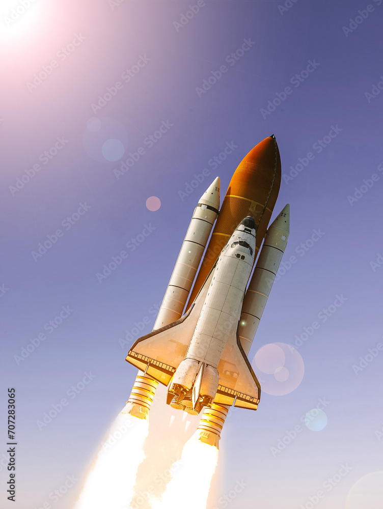 Naklejka premium Rocket above the earth. The elements of this image furnished by NASA.