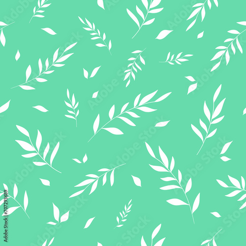 Seamless pattern with white leaves on green background.