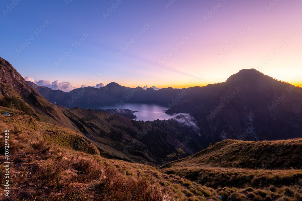 Rinjani Mount is an active volcano in Lombok, Indonesia. The second highest volcano in Indonesia. Rinjani Mount is an active volcano in Lombok, Indonesia. The second highest volcano in Indonesia.