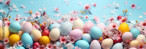 Easter background with Easter eggs and spring flowers. photo