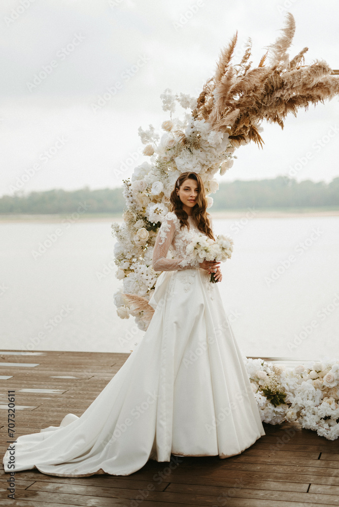 bride against the background of a yellow sunset bride against the background of a yellow sunset