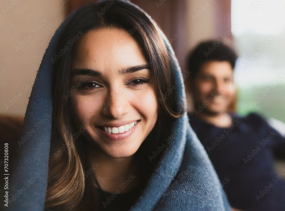 Φωτογραφία Latin couple on the sofa at home on winter season, smiling Latin woman funny smi