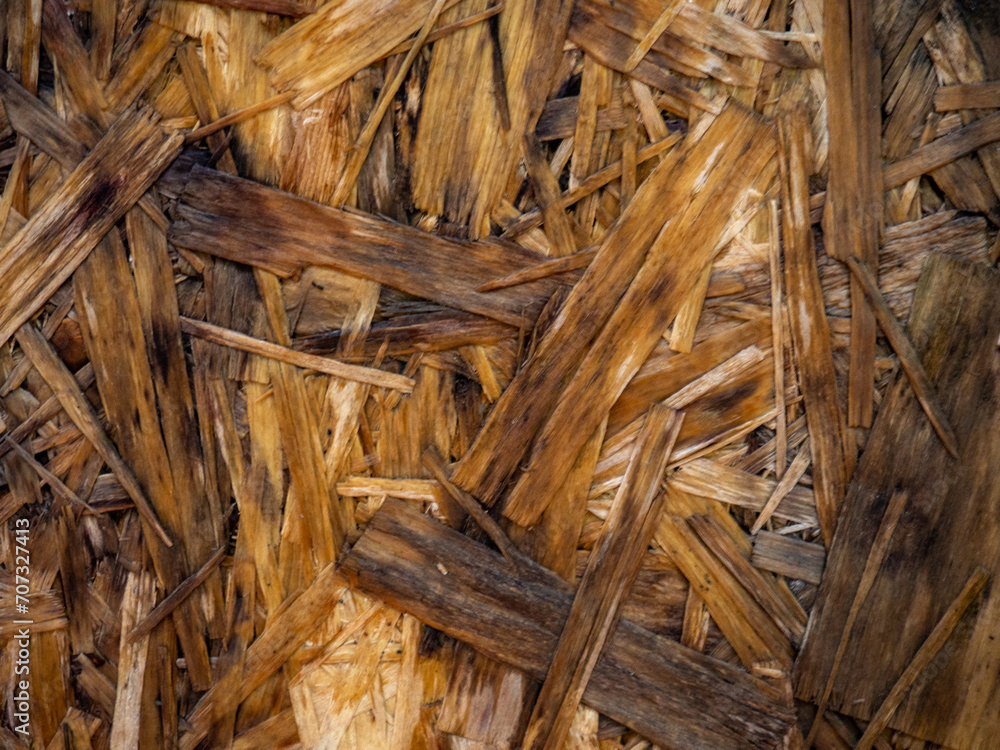 Pressed wood. Wood background. Pattern made of pressed sawdust. Pressed wood. Wood background. Pattern made of pressed sawdust.