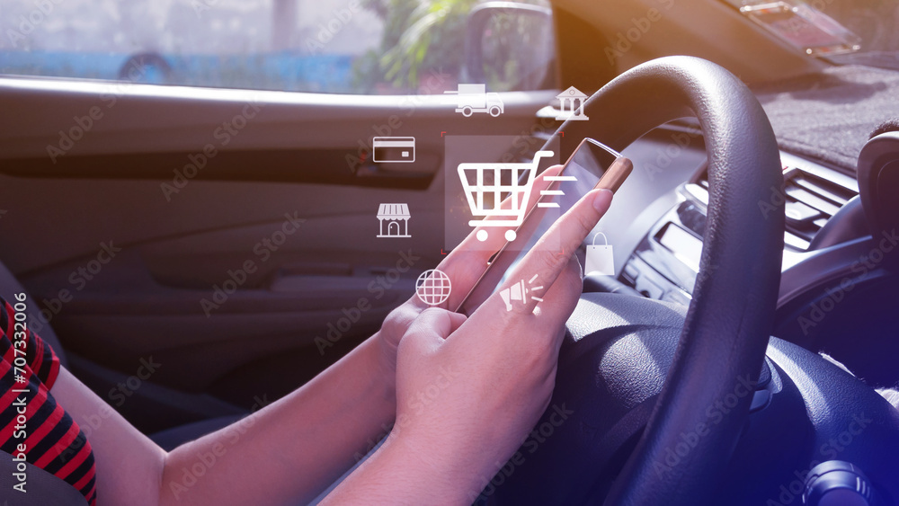 Shopping Online. Using Smartphone shopping online in car. shopping cart and business icons with virtual, business delivery e-commerce, shopping on internet, offers home delivery.