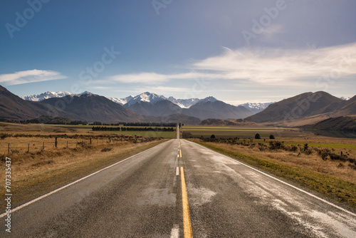 Highway through the valley to the snow caped southern alps photo