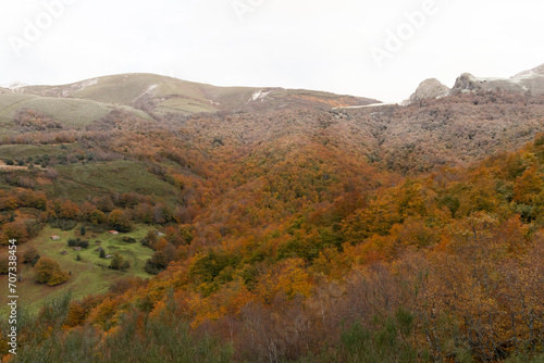 Autumn landscape with bright leaves and frozen peaks in Las Ubinas La Mesa National Park