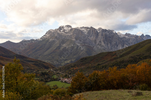 Peaks of Europe national park in northern Spain Cantabrian mountains during autumn at sunset with bright colorful leaves © Barosanu