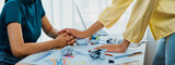 Panorama startup employee holding hand to stressed colleague due to failure, frustrated from no inspiration, lack of idea. Exhausted from overwhelm work and supportive coworker concept. Synergic