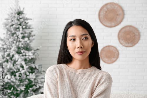 Portrait of thoughtful youn...