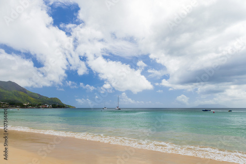 Summer landscape of Beau Vallon beach taken on a sunny day. Mahe island, Seychelles