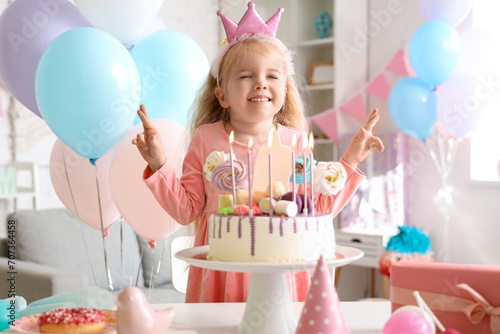 Cute little girl in crown w...