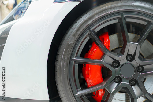 Alloy wheel with calipers and racing brakes of the sport car