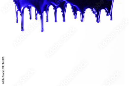 Blue metallic  paint leaking  dripping down over white background. Abstract background  copy space