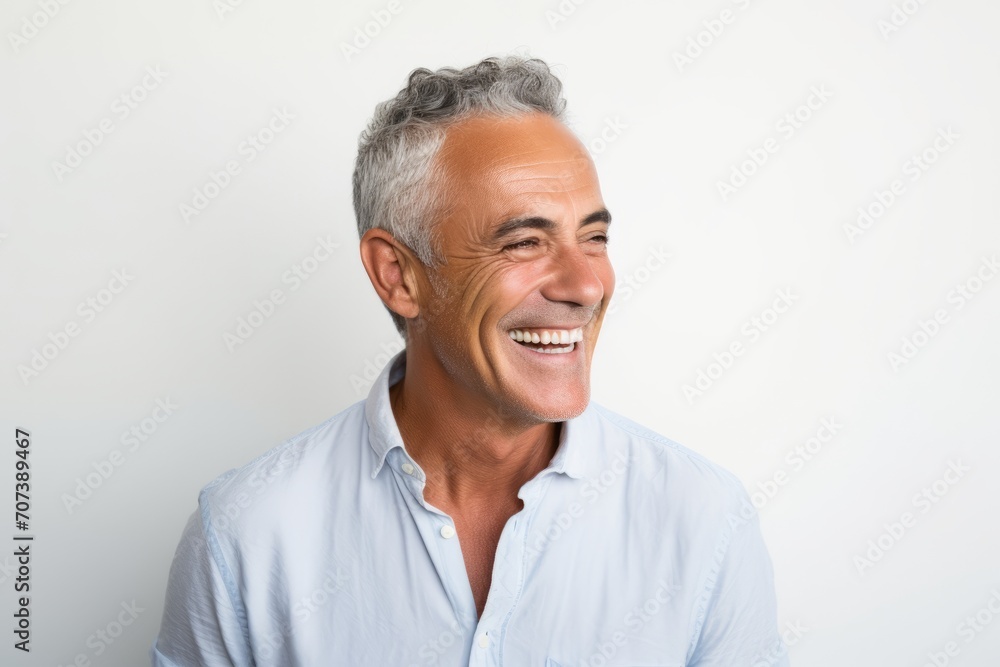 Portrait of happy senior man smiling. Isolated on white background. Portrait of happy senior man smiling. Isolated on white background.