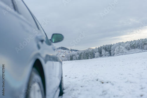 Slippery road.stopped car under a gray snowy sky.Road traffic in winter.Winter beautiful landscape and car. traffic in winter season 