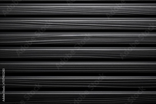 Close-up black metallic wall, abstract pattern background
