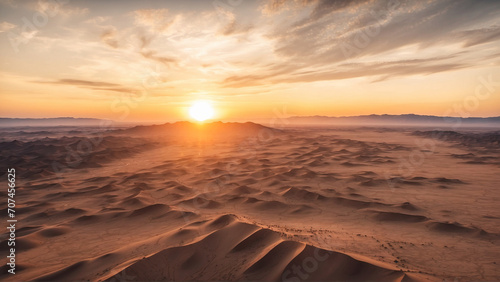 The vast desert at sunset seen from a drone s point of view