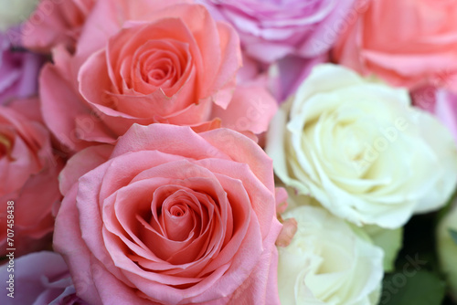 Beautiful bouquet of aromatic roses as background  closeup