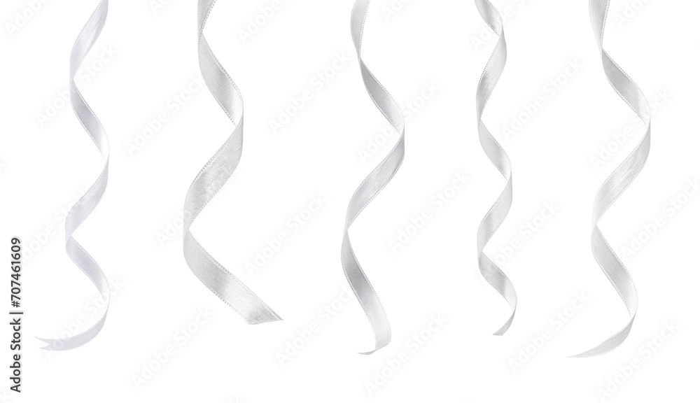 Fotografie White satin ribbons isolated on white, set
