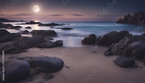 Night at beautiful beach with rocks with full moon