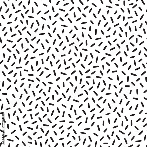 Small dash pattern on white background. Hand drawn small black dash seamless pattern. Simple minimal abstract  geometric texture design seamless background. Vector illustration