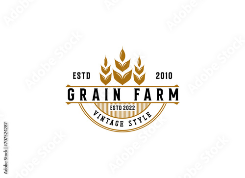 Vintage wheat farm logo design. Grain or wheat stamp logo