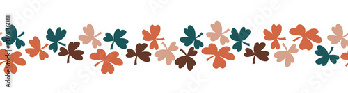 A decorative border of clover leaves is highlighted on a brown background. A pattern of leaves. Vector illustration. For nature, eco and design. Hand-drawn plants, a frame for a postcard.