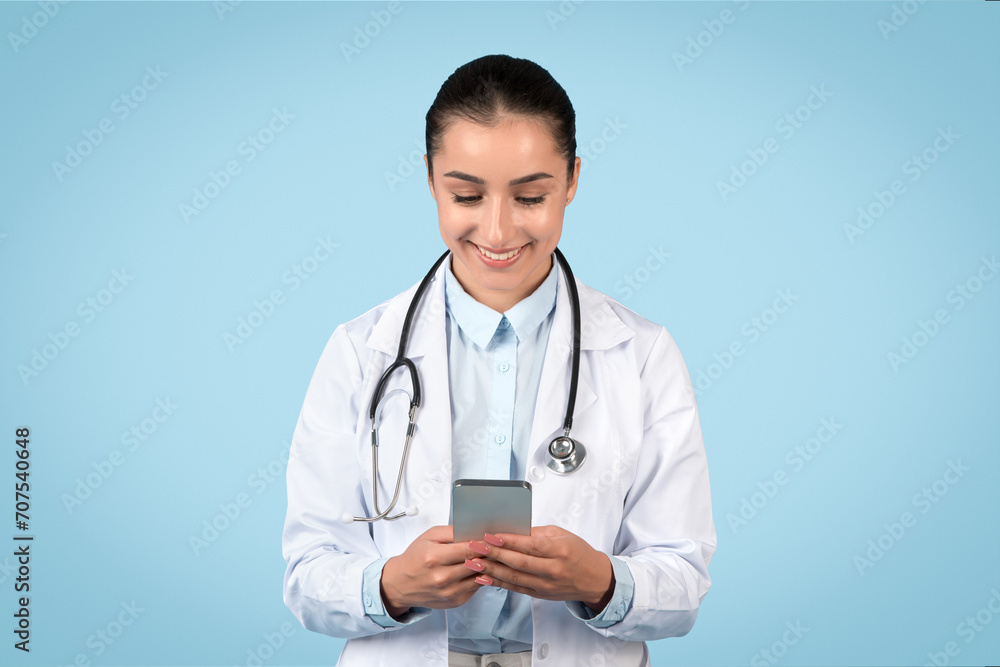 Female medic with mobile device for health management Female medic with mobile device for health management