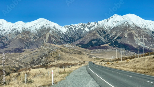 Highway through the mountain pass heading to the snow capped Southern Alps