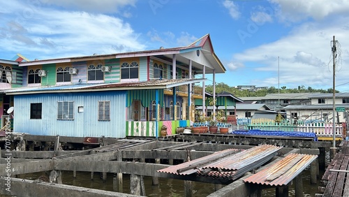 Floating village  Kampong Ayer. Bandar Seri Begawan in Brunei is a beautiful and harmonious Asian nation, situated on the northern coast of Borneo in the South China Sea. The purest air, immaculate co photo