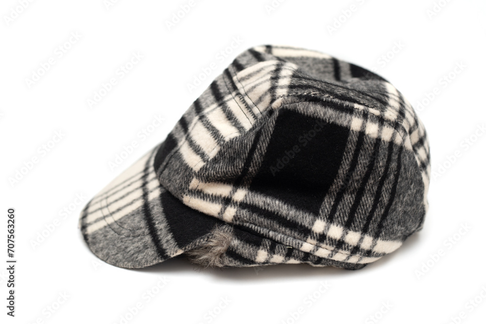 winter warm hat with a visor on a white background. winter warm hat with a visor on a white background.