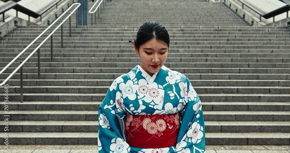 Japanese woman, travel and kimono by stairs, urban city and heritage for outdoor adventure. Young person, religion and traditional clothes in tokyo town with peace, respect and indigenous fashion