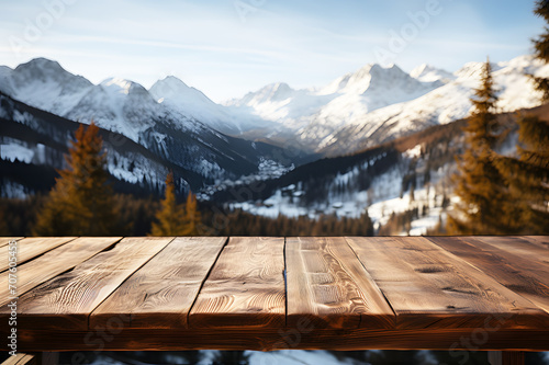 Empty brown wooden floor or table. mountain surrounded by snow landscape is background. Blue sky with white clouds, bright sunlight. Realistic color clipart template pattern. Abstract Texture. 