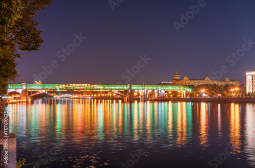 Pushkinskiy bridge with night illumination. Bridge to Gorky Park.