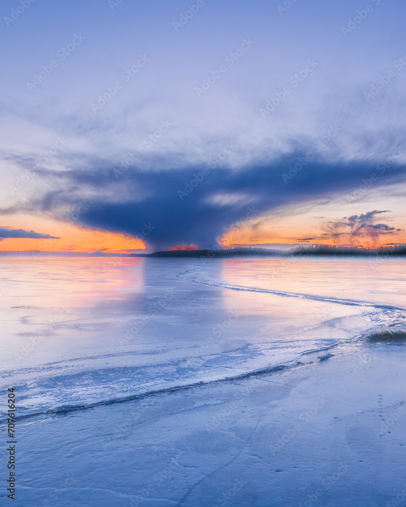 cloud reflected frozen lake