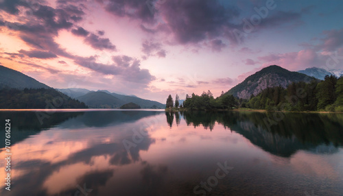  Beautiful pink cloudy sunset over a still mountain lake  dramatic colors photograph
