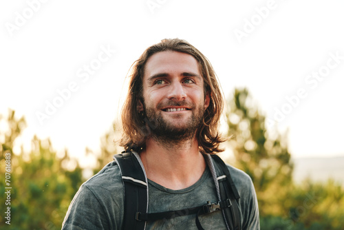 Portrait of hiker man with backpack trekking in the mountains © fotofabrika