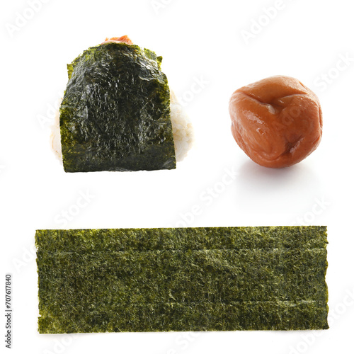 rice ball onigiri with pickled plum and seaweed photo