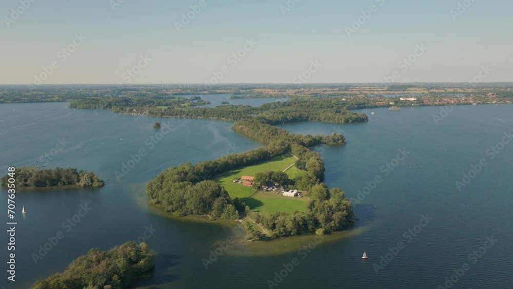 Plön Prinzeninsel Princes Island on warm sunny day with beautiful waters Plön Prinzeninsel Princes Island on warm sunny day with beautiful waters
