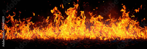 Texture of fire on black background, Flame, fire with smoke on dark background. black walls and smoke. Abstract dark glitter fire particles lights. fire in motion blur.