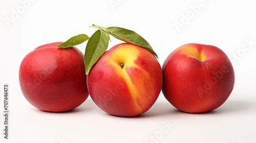 Three juicy, succulent nectarines captured in a close-up realistic photo against a white background Generative AI