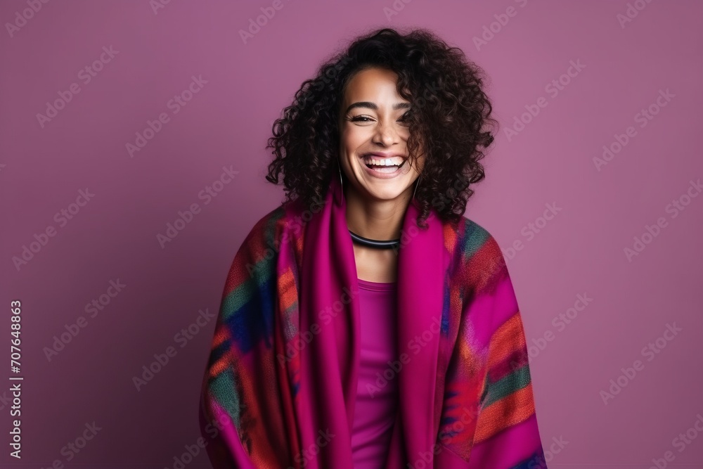 Portrait of a beautiful young african american woman with curly hair and colorful scarf Portrait of a beautiful young african american woman with curly hair and colorful scarf
