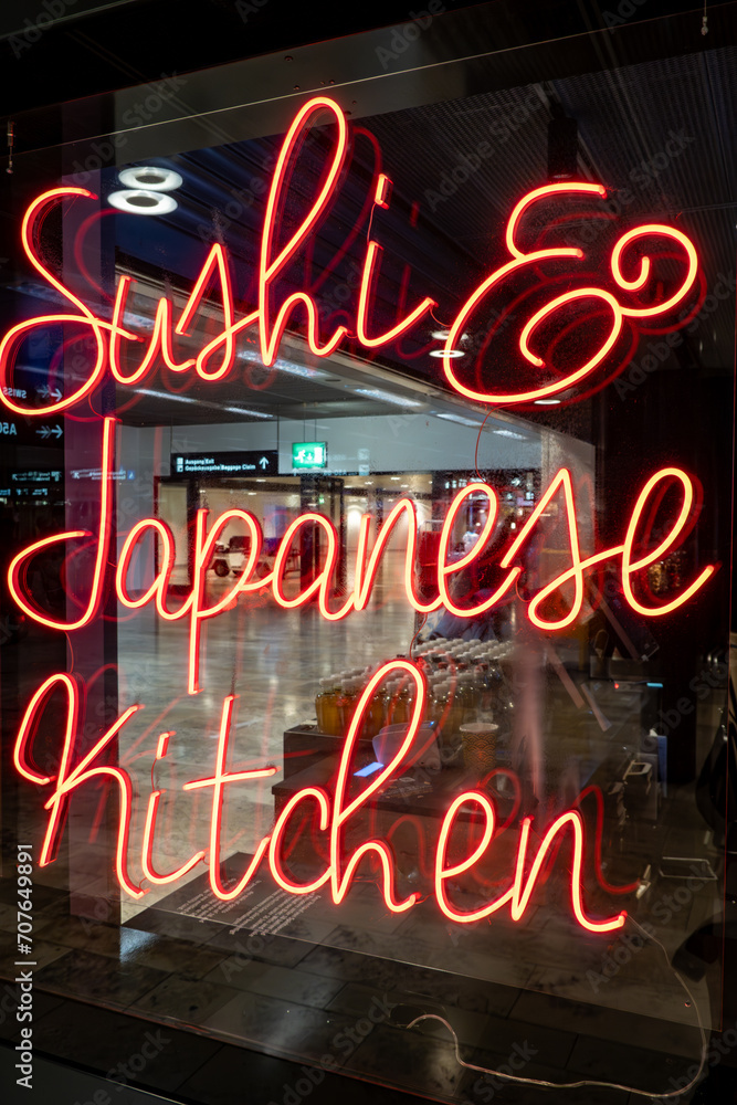 Φωτογραφία Zurich, Switzerland A neon display in the window of a sushi and japanese restuarant in the Zurich airport